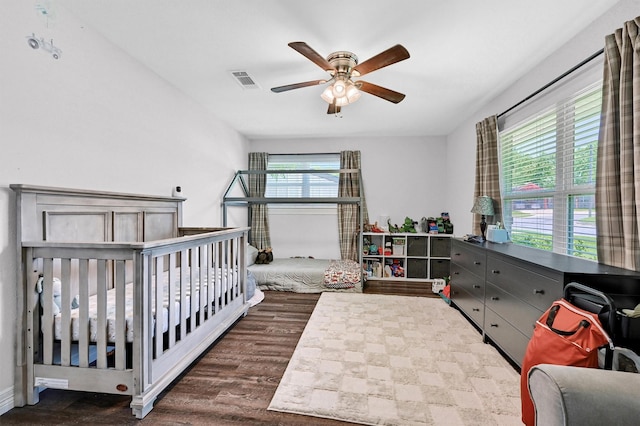 1705 W Belden St, Sherman, TX 75092 - bedroom featuring dark wood-type flooring and ceiling fan