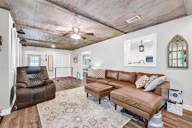 1705 W Belden St, Sherman, TX 75092 - living area featuring wooden ceiling, baseboards, wood finished floors, and ceiling fan