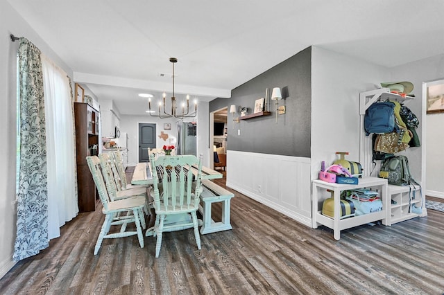 1705 W Belden St, Sherman, TX 75092 - dining room with a chandelier, dark wood-style flooring, and wainscoting
