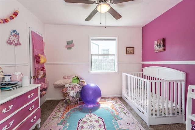 216 E Tennie St, Gainesville, TX 76240 - bedroom featuring a crib, carpet, ceiling fan, and baseboards