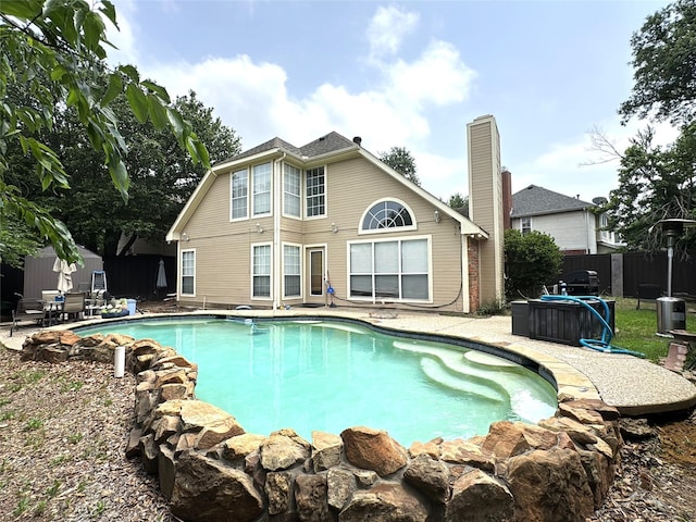 600 Black Rock Ct, Irving, TX 75063 - rear view of property with a patio