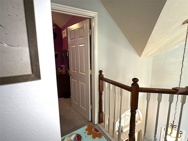 600 Black Rock Ct, Irving, TX 75063 - stairs with vaulted ceiling, carpet flooring, and a textured ceiling