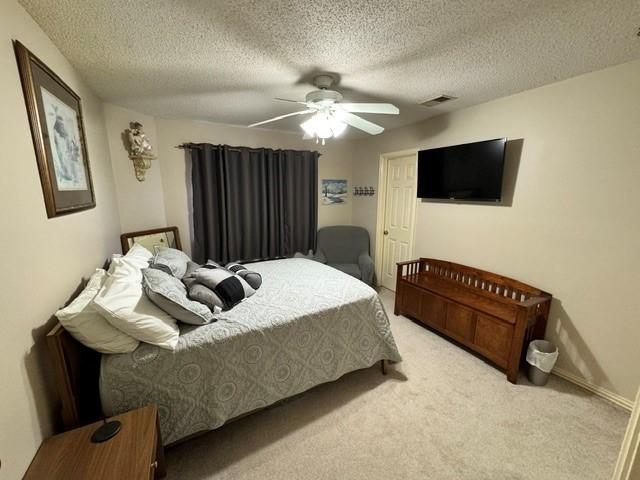 600 Black Rock Ct, Irving, TX 75063 - stairs with vaulted ceiling, carpet, and a textured ceiling