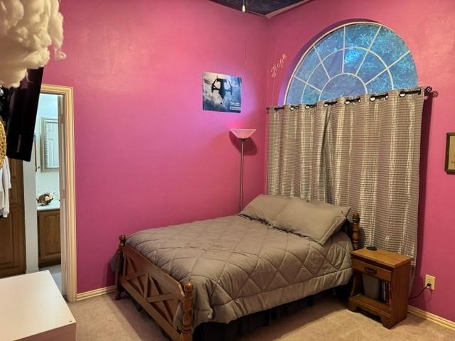 600 Black Rock Ct, Irving, TX 75063 - bedroom featuring carpet floors and baseboards
