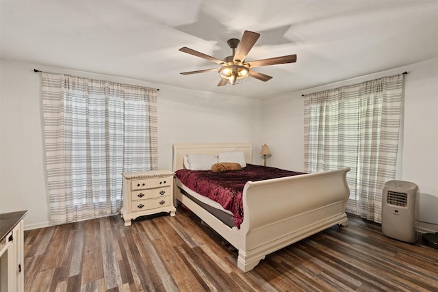 519 S Pearl St, Kemp, TX 75143 - bedroom with wood finished floors and a ceiling fan