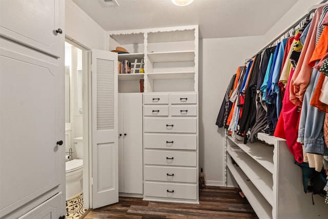 519 S Pearl St, Kemp, TX 75143 - walk in closet with dark wood finished floors