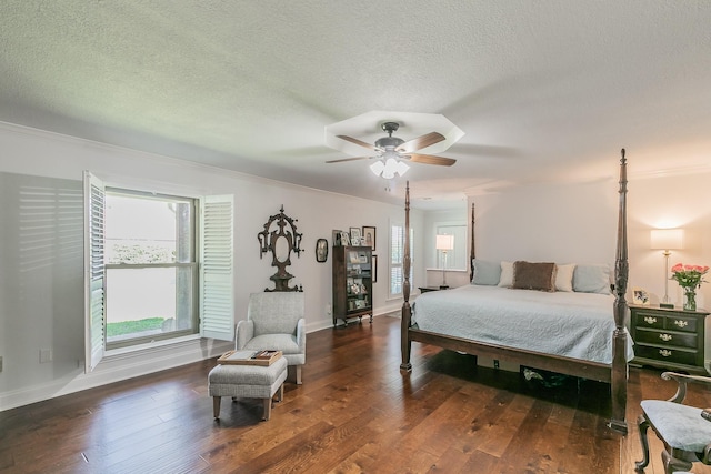 1233 Stegall Rd, Keller, TX 76248 - bedroom with hardwood / wood-style floors, a textured ceiling, ornamental molding, ceiling fan, and baseboards