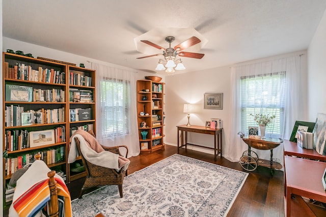 1233 Stegall Rd, Keller, TX 76248 - sitting room featuring a ceiling fan, healthy amount of natural light, and dark wood-style flooring