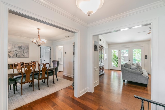 1233 Stegall Rd, Keller, TX 76248 - dining room with dark wood-style floors, a chandelier, ornamental molding, baseboards, and ceiling fan