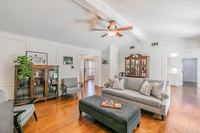 1233 Stegall Rd, Keller, TX 76248 - living area with a decorative wall, a ceiling fan, and wood finished floors