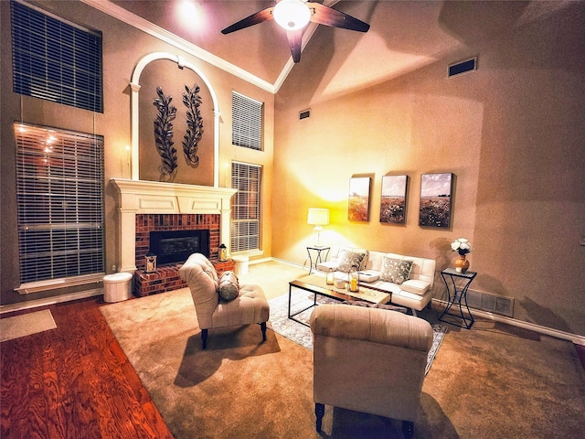 1308 Crown Point Rd, Mckinney, TX 75072 - living area featuring ornamental molding, ceiling fan, wood finished floors, baseboards, and a fireplace