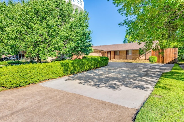 403 E Alexander Ln, Euless, TX 76040 - view of front of house with concrete driveway and brick siding