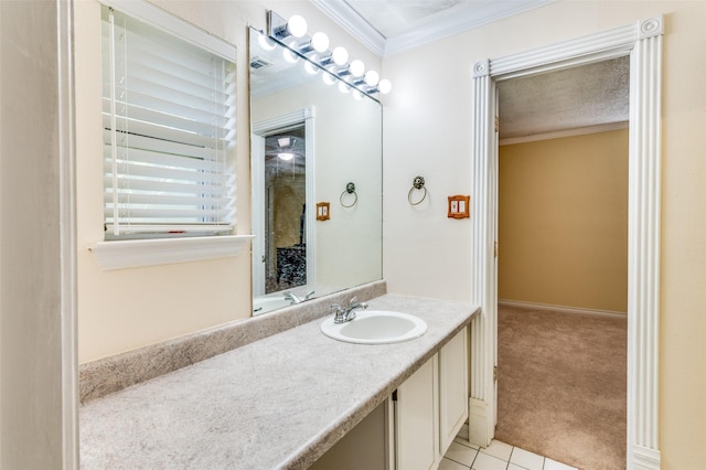 403 E Alexander Ln, Euless, TX 76040 - bathroom featuring tile patterned floors, crown molding, and vanity