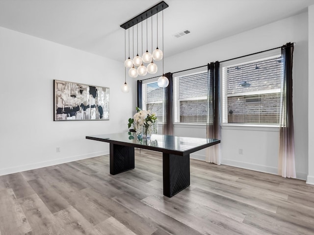 1708 Jamestown Dr, Forney, TX 75126 - unfurnished dining area featuring wood finished floors and baseboards