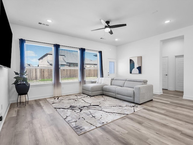 1708 Jamestown Dr, Forney, TX 75126 - living room with ceiling fan, wood finished floors, baseboards, and recessed lighting