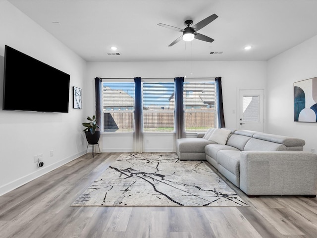 1708 Jamestown Dr, Forney, TX 75126 - living room with ceiling fan, wood finished floors, plenty of natural light, recessed lighting, and baseboards