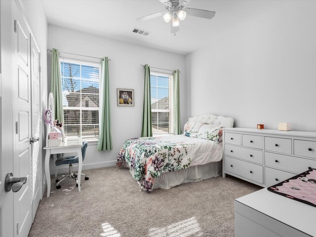 1708 Jamestown Dr, Forney, TX 75126 - bedroom with light colored carpet, multiple windows, baseboards, and ceiling fan