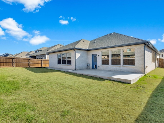 1708 Jamestown Dr, Forney, TX 75126 - rear view of house with brick siding, a patio area, and a shingled roof
