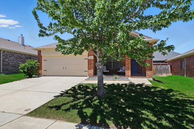 544 Baverton Ln, Fort Worth, TX 76052 - obstructed view of property with brick siding, a garage, and driveway