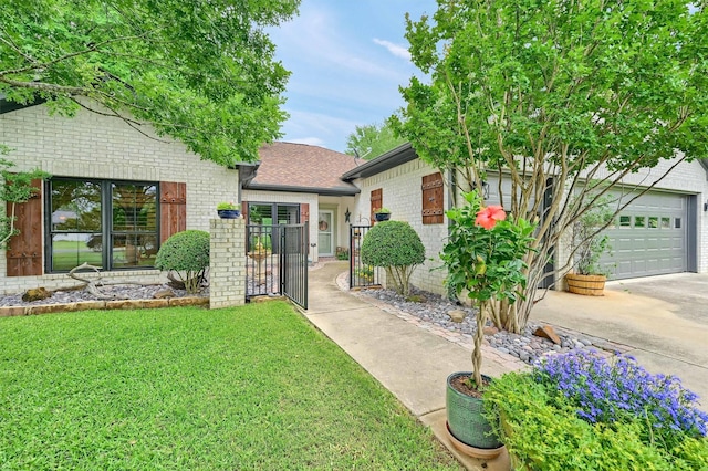 218 Cayuga Trl, Lake Kiowa, TX 76240 - view of front facade with brick siding, a front yard, concrete driveway, and roof with shingles
