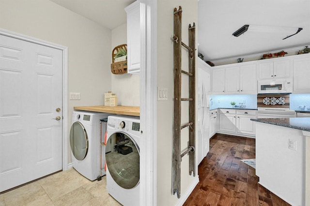 218 Cayuga Trl, Lake Kiowa, TX 76240 - laundry area with washing machine and dryer and dark wood-style floors