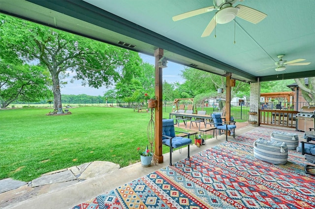 218 Cayuga Trl, Lake Kiowa, TX 76240 - view of patio featuring ceiling fan, an outdoor hangout area, and grilling area