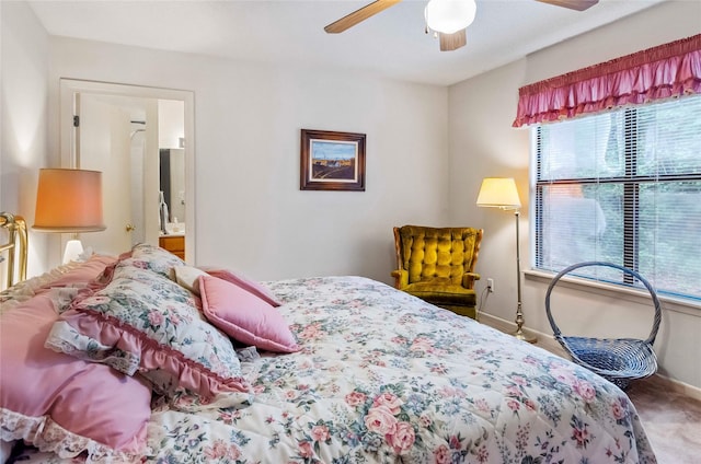 1161 Valleywood Trl, Holly Lake Ranch, TX 75765 - carpeted bedroom featuring baseboards, a ceiling fan, and ensuite bathroom