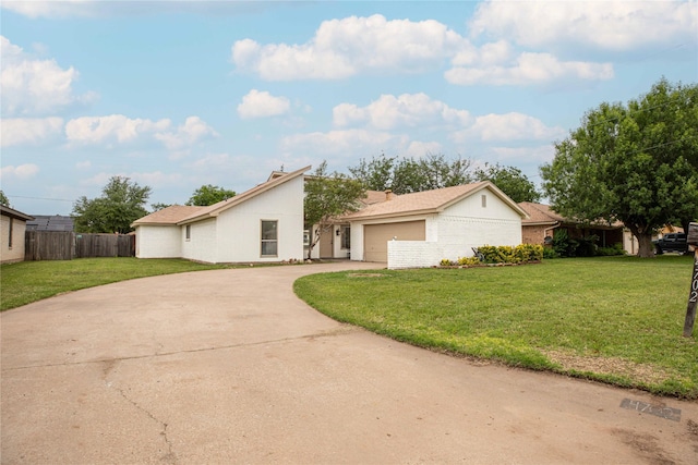 4702 Pamela Dr, Abilene, TX 79606 - mid-century modern home with driveway and an attached garage