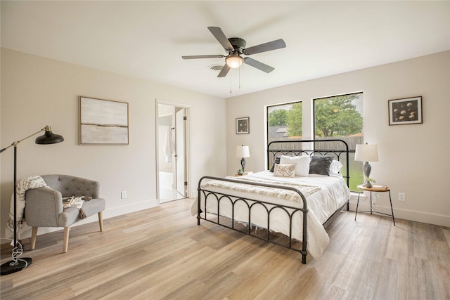 4702 Pamela Dr, Abilene, TX 79606 - bedroom featuring light wood-type flooring, baseboards, ceiling fan, and ensuite bathroom