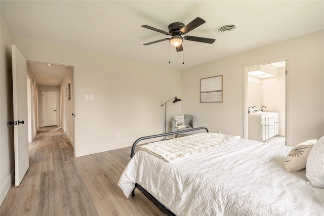 4702 Pamela Dr, Abilene, TX 79606 - bedroom featuring wood finished floors, baseboards, and ceiling fan