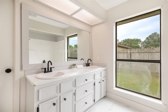 4702 Pamela Dr, Abilene, TX 79606 - bathroom with marble finish flooring and double vanity