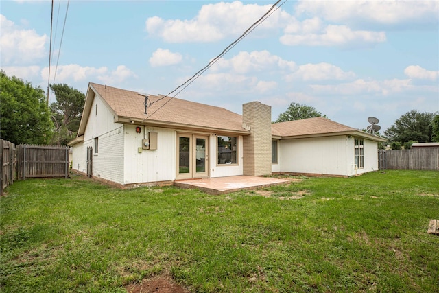 4702 Pamela Dr, Abilene, TX 79606 - back of property featuring a chimney and a patio area