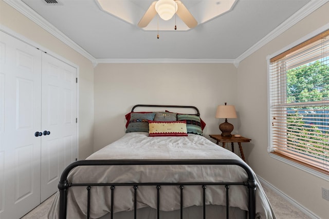 711 Aqua Vista Dr, Granbury, TX 76049 - carpeted bedroom featuring ornamental molding, baseboards, a ceiling fan, and a closet