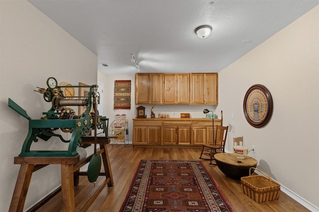 711 Aqua Vista Dr, Granbury, TX 76049 - kitchen with wood finished floors and baseboards