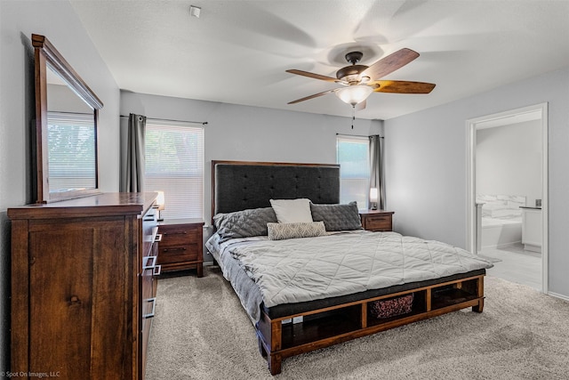 3809 San Lorenzo Dr, Denton, TX 76210 - carpeted bedroom with ensuite bathroom, ceiling fan, and baseboards