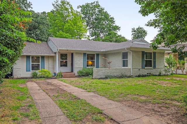 11202 Myrtice Dr, Dallas, TX 75228 - single story home featuring brick siding, roof with shingles, and a front lawn