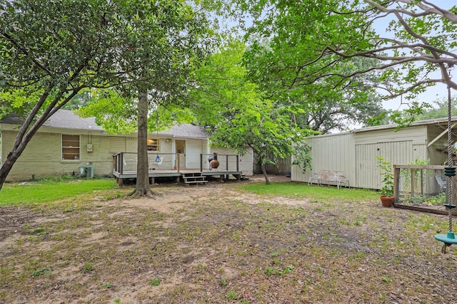 11202 Myrtice Dr, Dallas, TX 75228 - view of yard featuring a deck and cooling unit