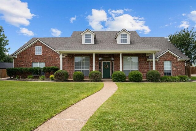 809 Remington Park, Robinson, TX 76706 - view of front of property with brick siding and a shingled roof