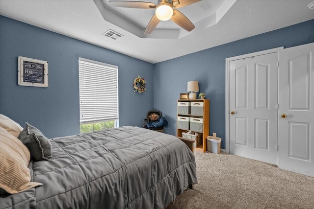 809 Remington Park, Robinson, TX 76706 - bedroom featuring carpet flooring, a raised ceiling, and ceiling fan