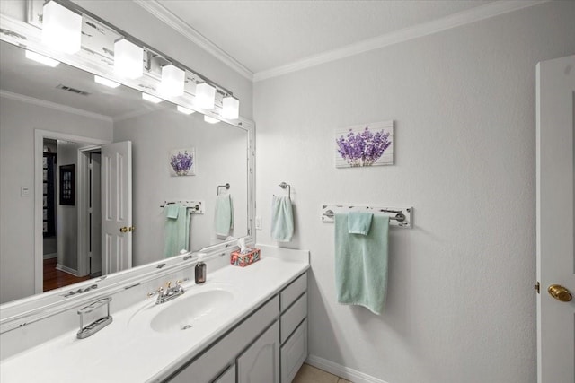 809 Remington Park, Robinson, TX 76706 - bathroom with ornamental molding, vanity, and baseboards