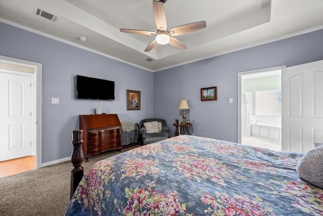 809 Remington Park, Robinson, TX 76706 - bedroom featuring carpet floors, a tray ceiling, crown molding, ceiling fan, and baseboards