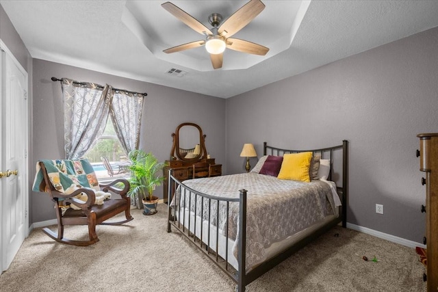 809 Remington Park, Robinson, TX 76706 - carpeted bedroom with baseboards, a ceiling fan, and a raised ceiling