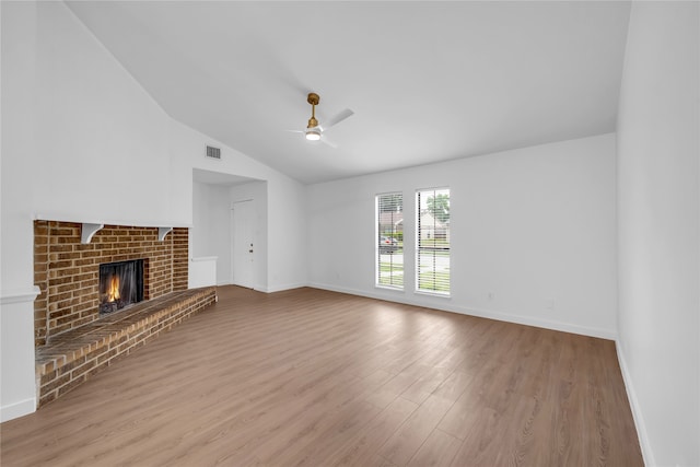 808 Warwick Dr, Plano, TX 75023 - unfurnished living room with lofted ceiling, wood finished floors, a ceiling fan, baseboards, and a fireplace
