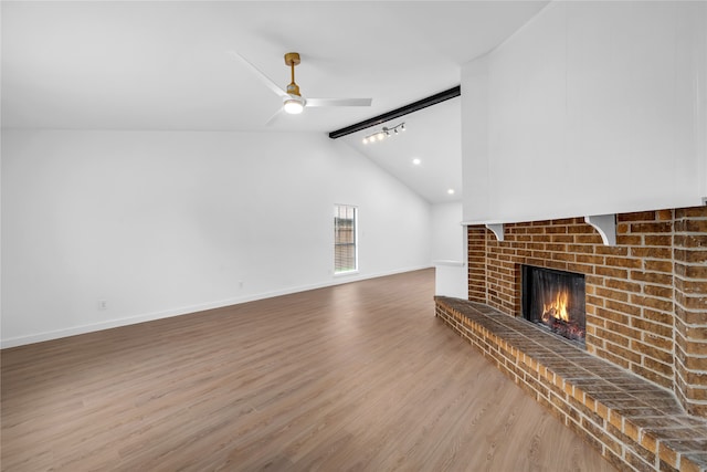 808 Warwick Dr, Plano, TX 75023 - unfurnished living room with wood finished floors, a fireplace, ceiling fan, and baseboards