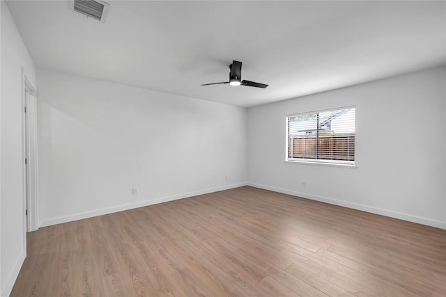 808 Warwick Dr, Plano, TX 75023 - unfurnished room with a ceiling fan, light wood-style floors, and baseboards