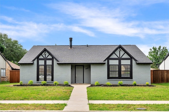 808 Warwick Dr, Plano, TX 75023 - tudor home with roof with shingles and brick siding