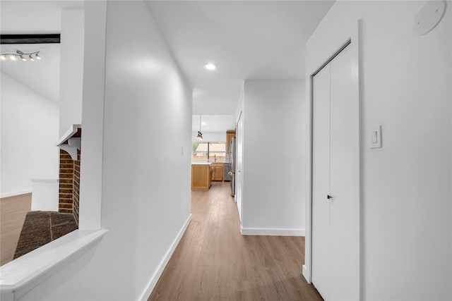 808 Warwick Dr, Plano, TX 75023 - hall with light wood finished floors, baseboards, and recessed lighting