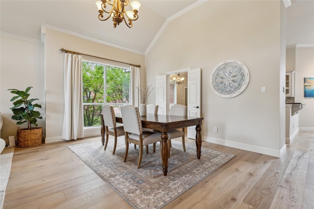 3927 Walden Way, Dallas, TX 75287 - dining room featuring a chandelier, light wood-style flooring, crown molding, baseboards, and high vaulted ceiling