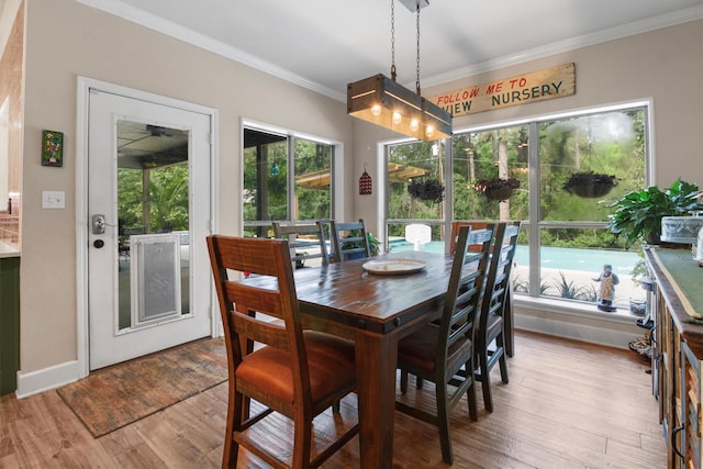 18551 Lazy Ln, Flint, TX 75762 - dining area with ornamental molding and wood finished floors