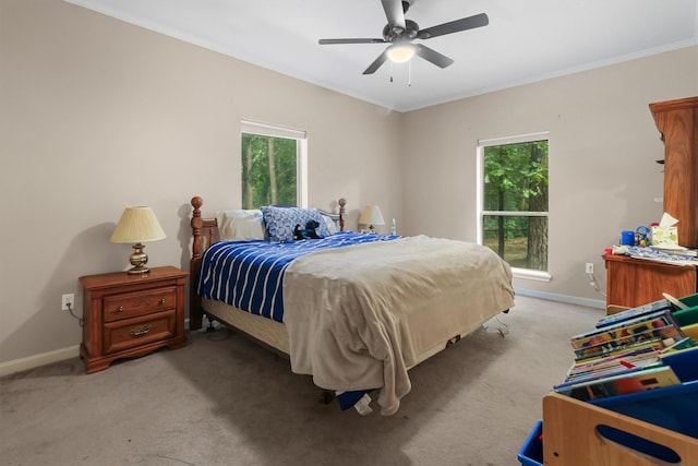18551 Lazy Ln, Flint, TX 75762 - bedroom featuring multiple windows, baseboards, crown molding, and light carpet